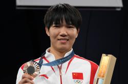 开云APP-日本选手在柔道项目中斩获金牌